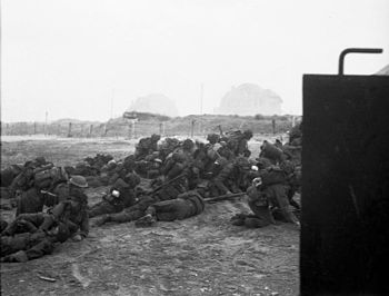 Dead and wounded infantry on Sword beach, on t...