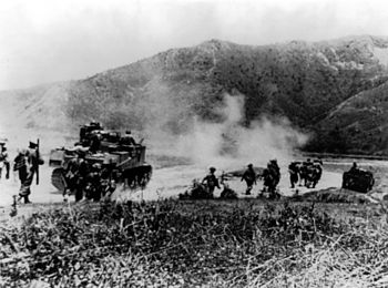 Gurkhas advancing with tanks to clear the Japa...